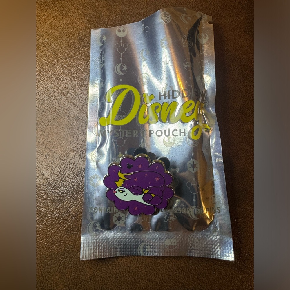 Disney Parks Hidden Mickey Mystery Pouch Opened- Fantasia Goldfish Pin